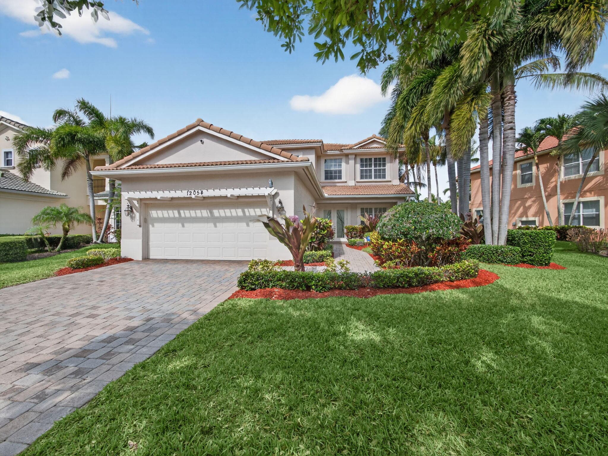 12054 Aviles Circle, Palm Beach Gardens, FL 33418 — photo 1 of 59