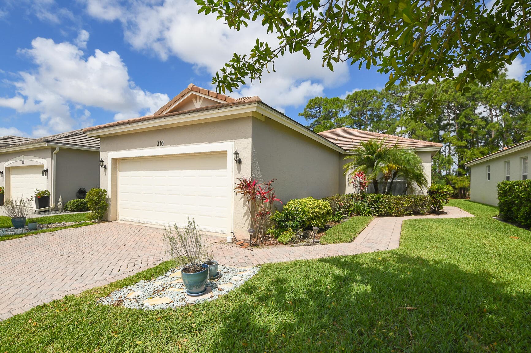316 SW Maclay Way, Port St. Lucie, FL 34986 — photo 1 of 45