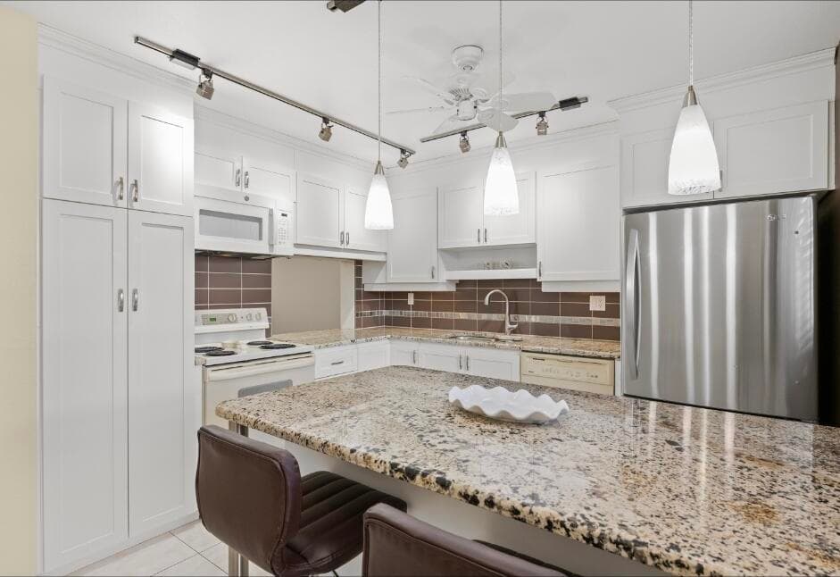 6095 N Sabal Palm Boulevard 210, Tamarac, FL 33319 — photo 2 of 23