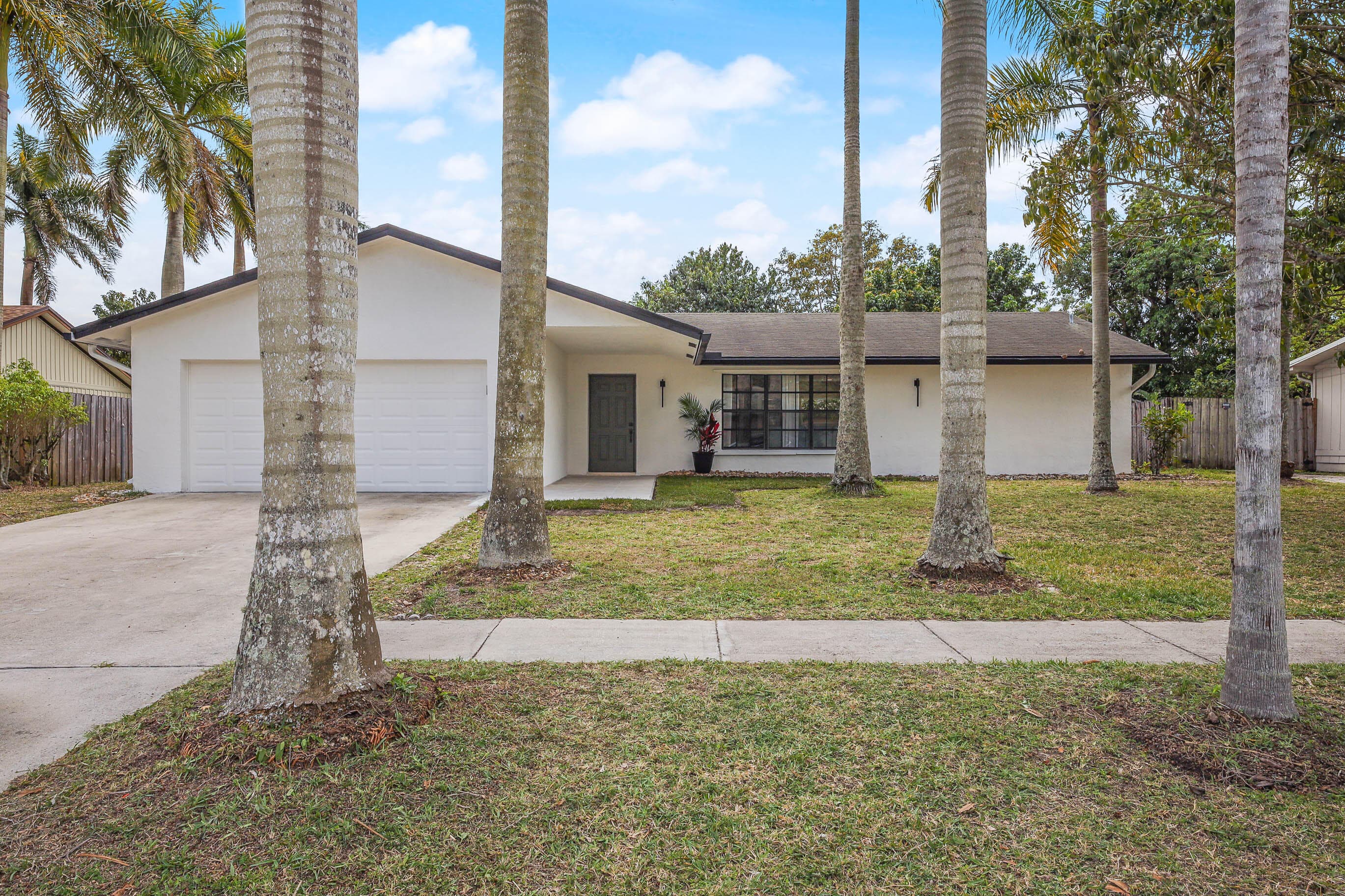 430 La Mancha Avenue, Royal Palm Beach, FL 33411 — photo 41 of 56
