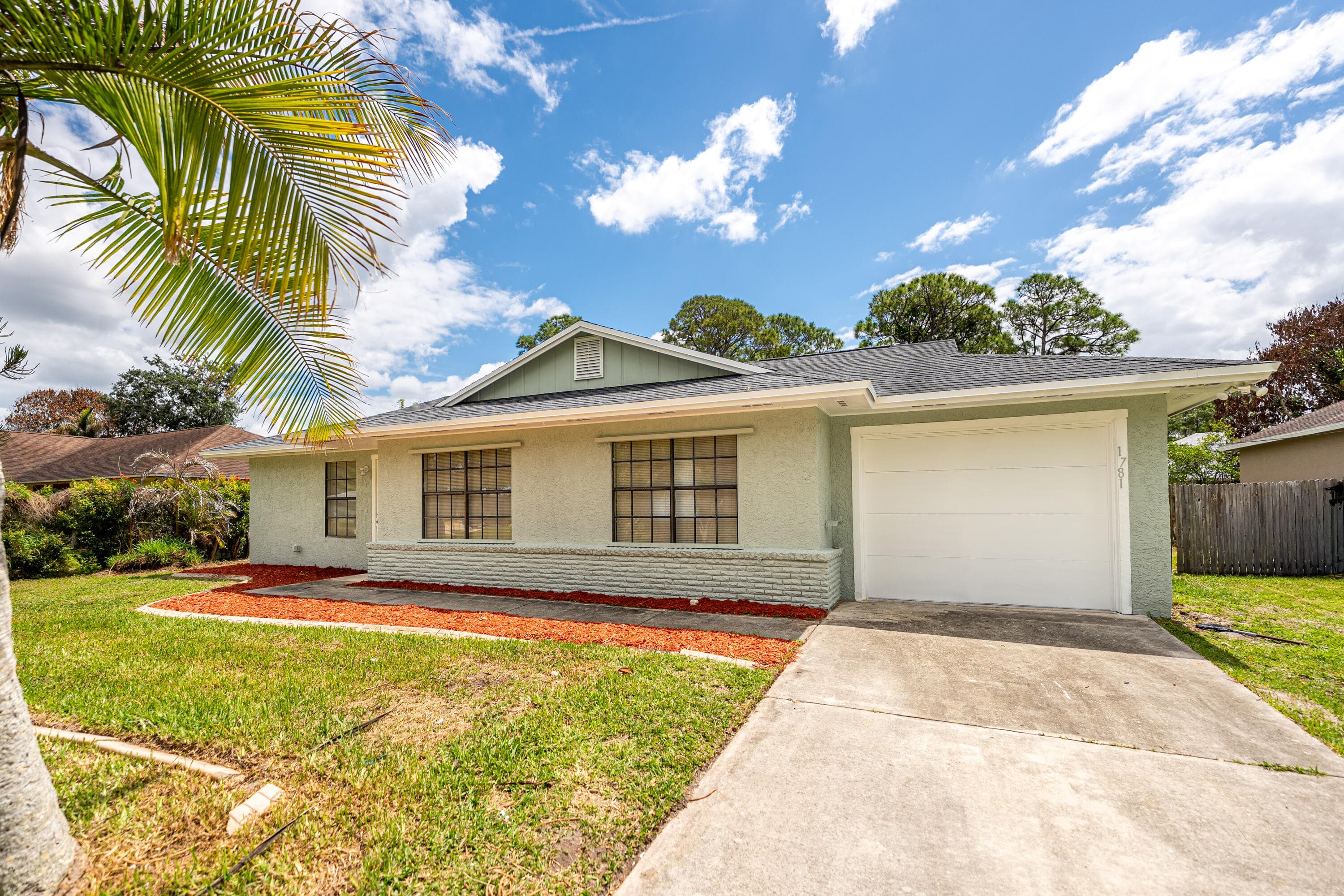1781 SW Cloverleaf Street, Port St. Lucie, FL 34953 — photo 1 of 65