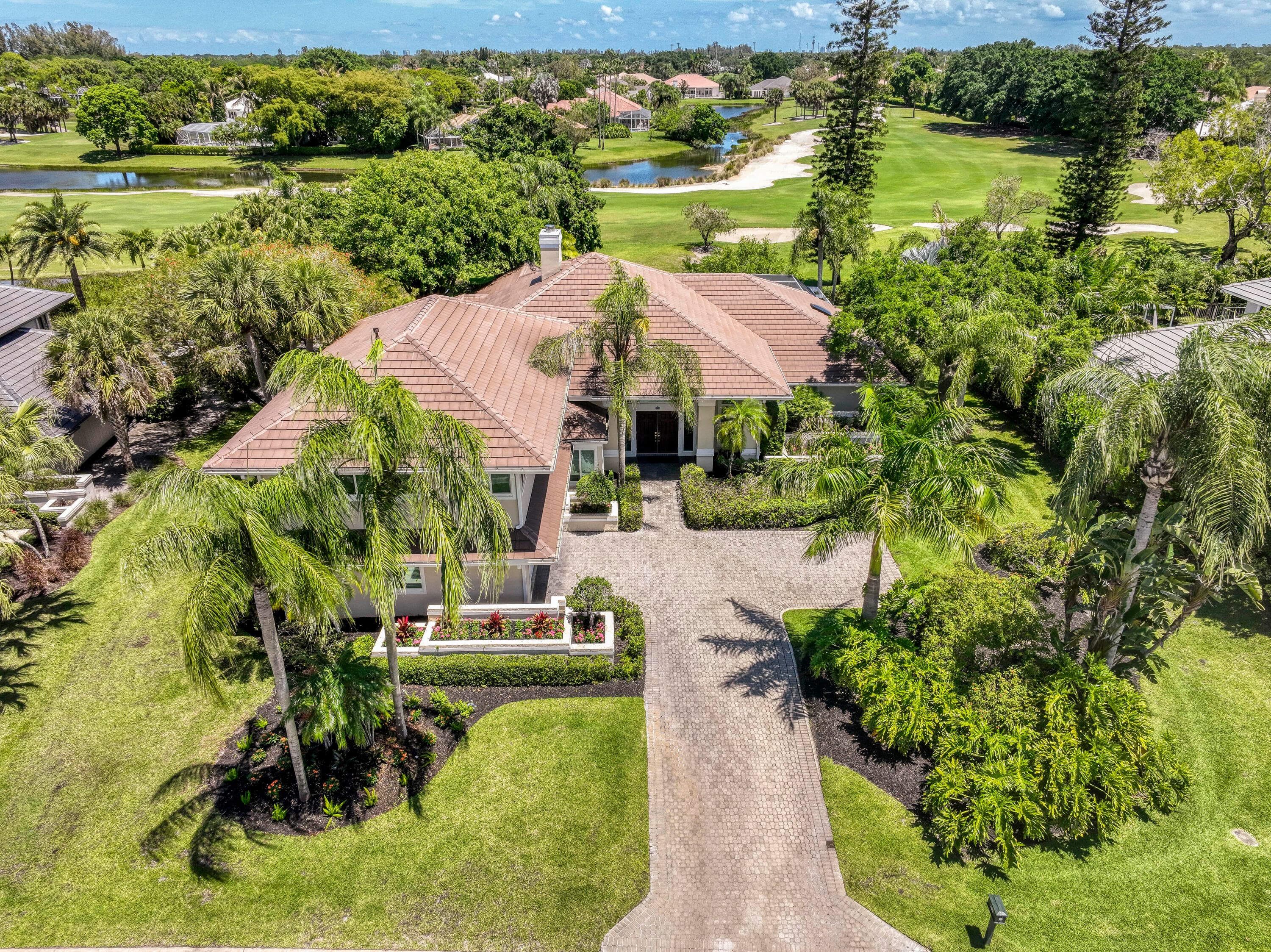 185 Thornton Drive, Palm Beach Gardens, FL 33418 — photo 1 of 54