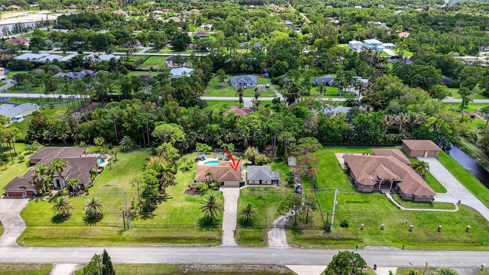 12206 Temple Boulevard, The Acreage, FL 33412 — photo 49 of 56