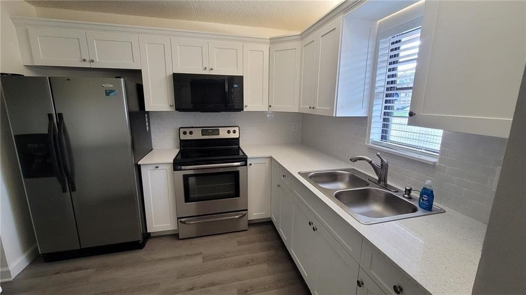 9273 SW 8th Street 109, Boca Raton, FL 33428 — photo 1 of 20
