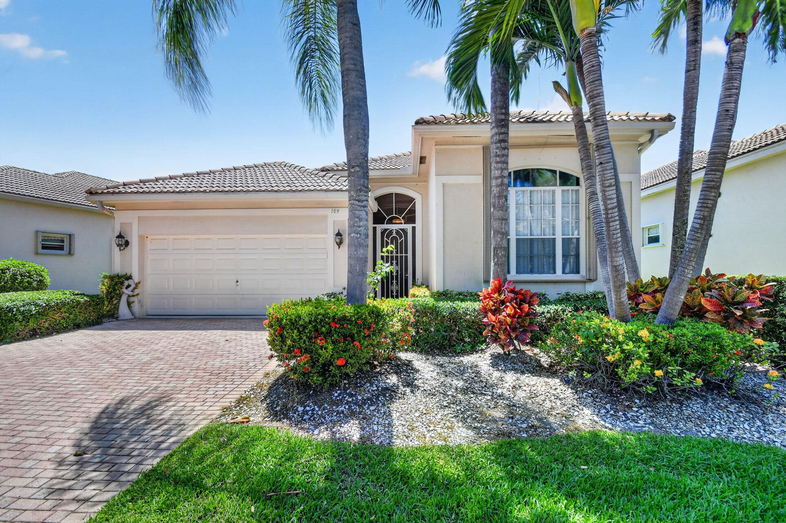 109 Palm Circle, Atlantis, FL 33462 — photo 2 of 58