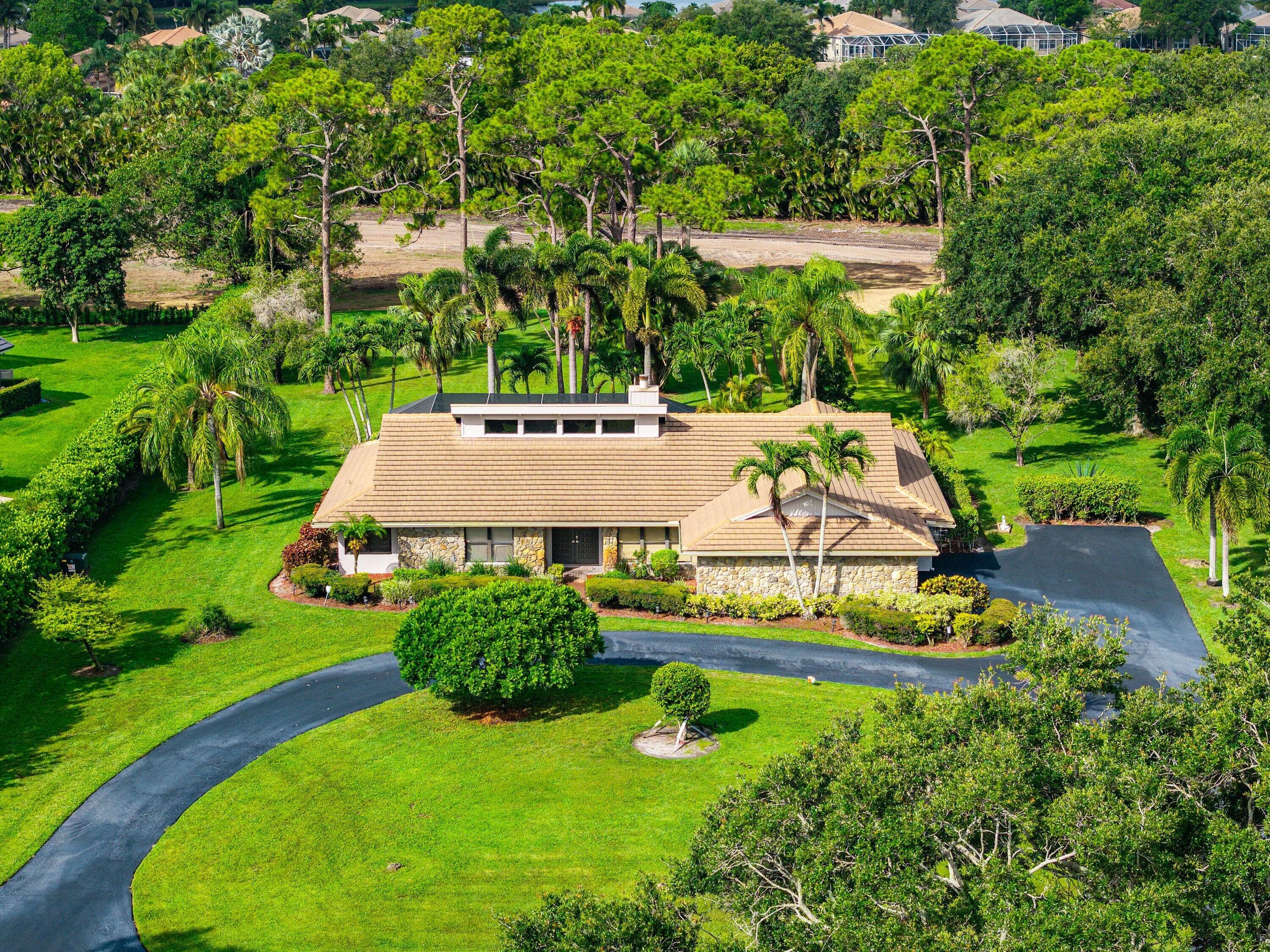 9405 Dundee Drive, Lake Worth, FL 33467 — photo 1 of 41