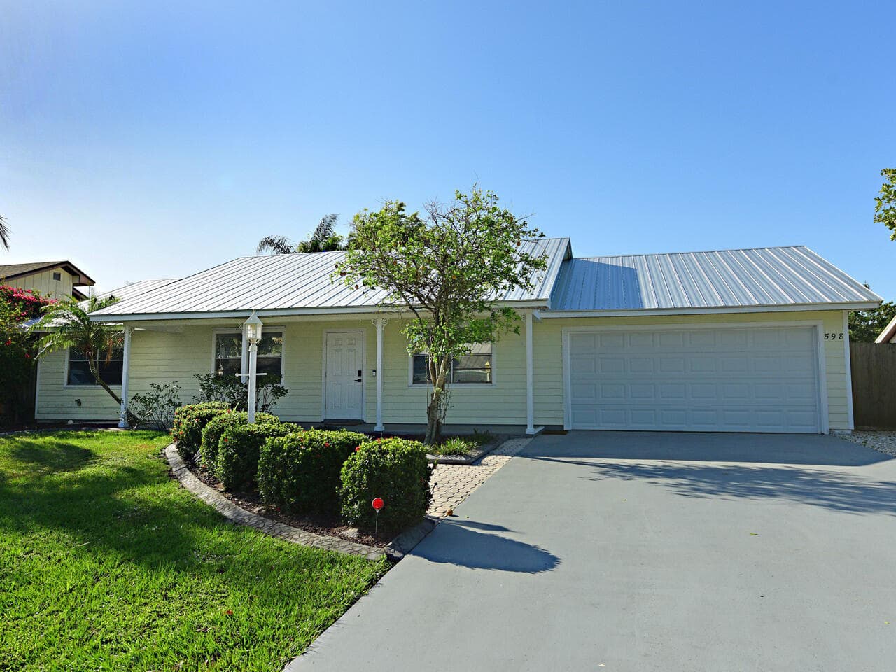 598 NE Maranta Terrado, Jensen Beach, FL 34957 — photo 1 of 22