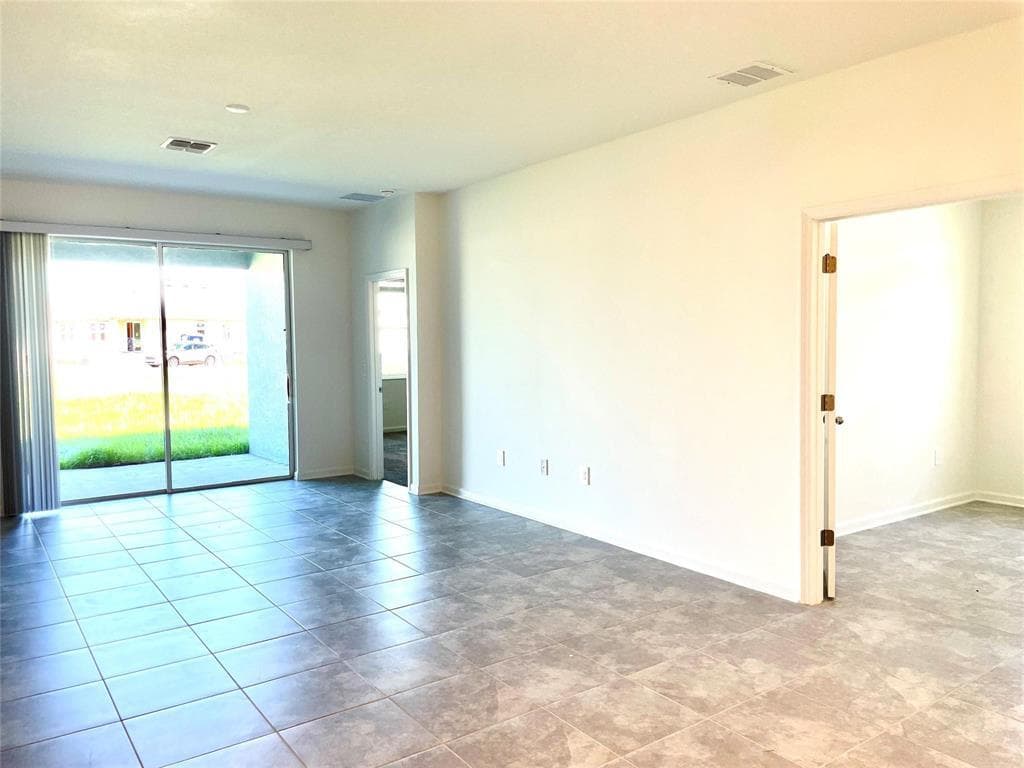 316 Heroic Road, Davenport, FL 33837 — photo 9 of 18