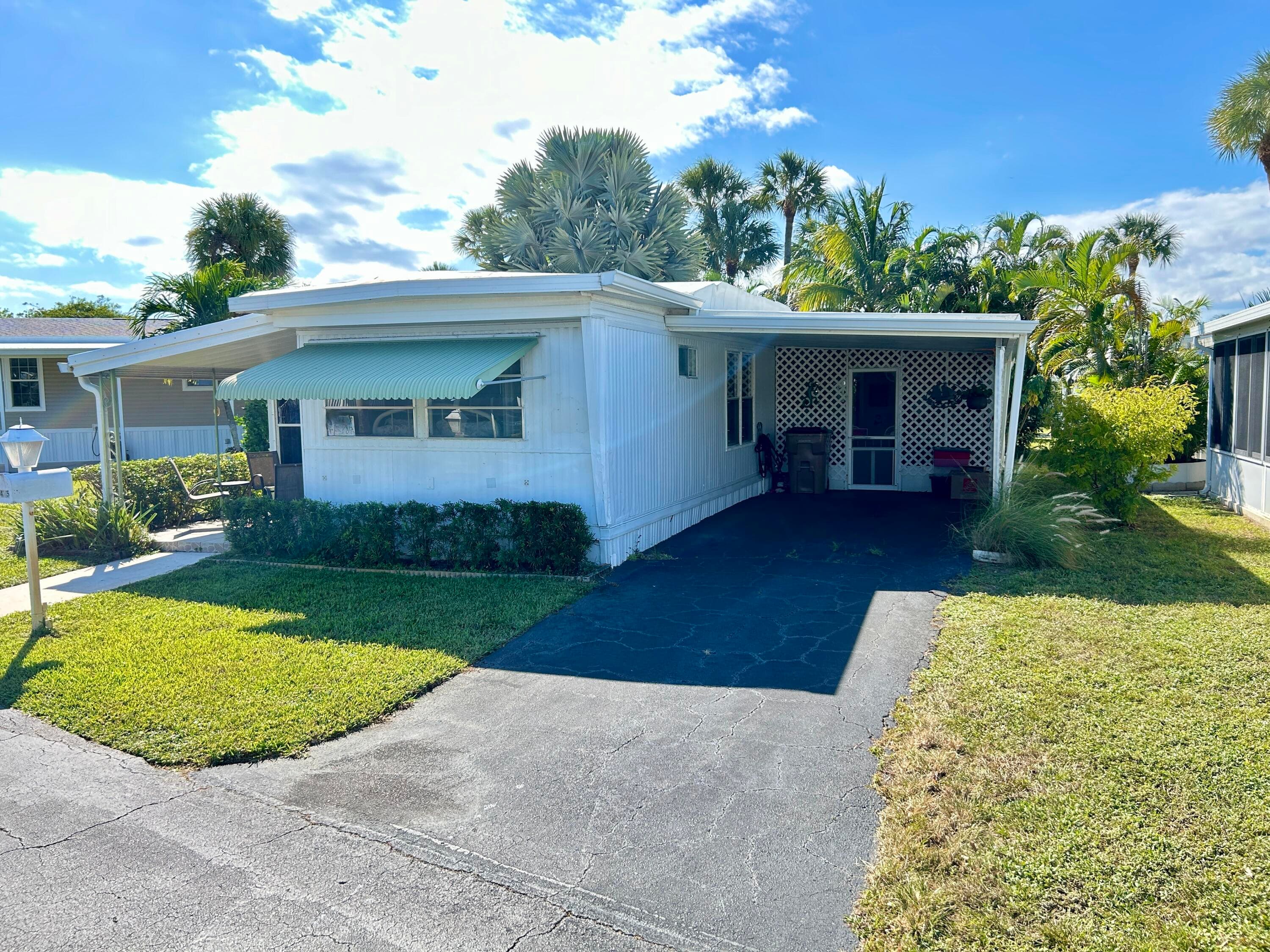 425 Bougainvilla Drive, Deerfield Beach, FL 33442 — photo 2 of 43