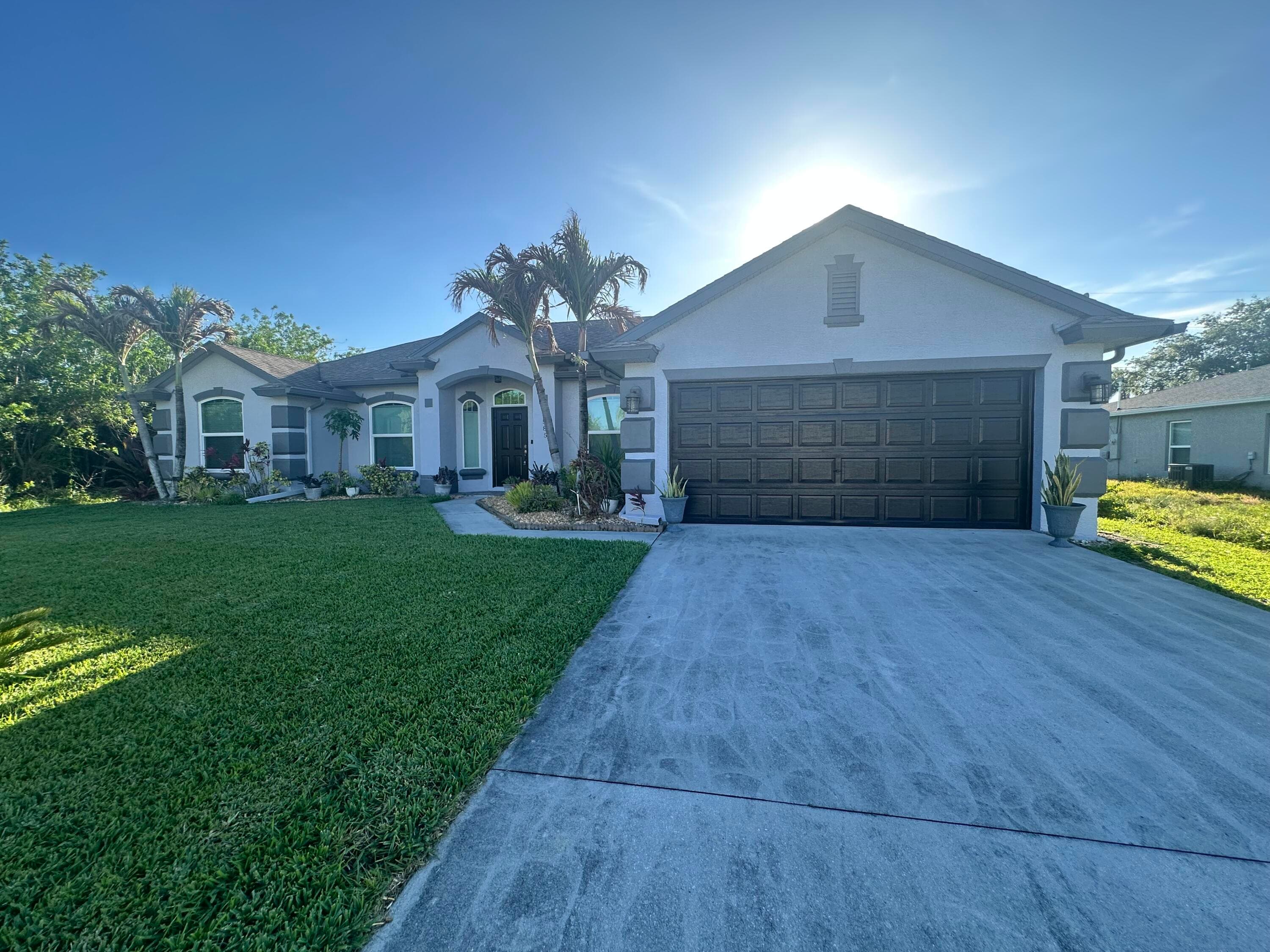 585 SW Undallo Road, Port St. Lucie, FL 34953 — photo 1 of 18