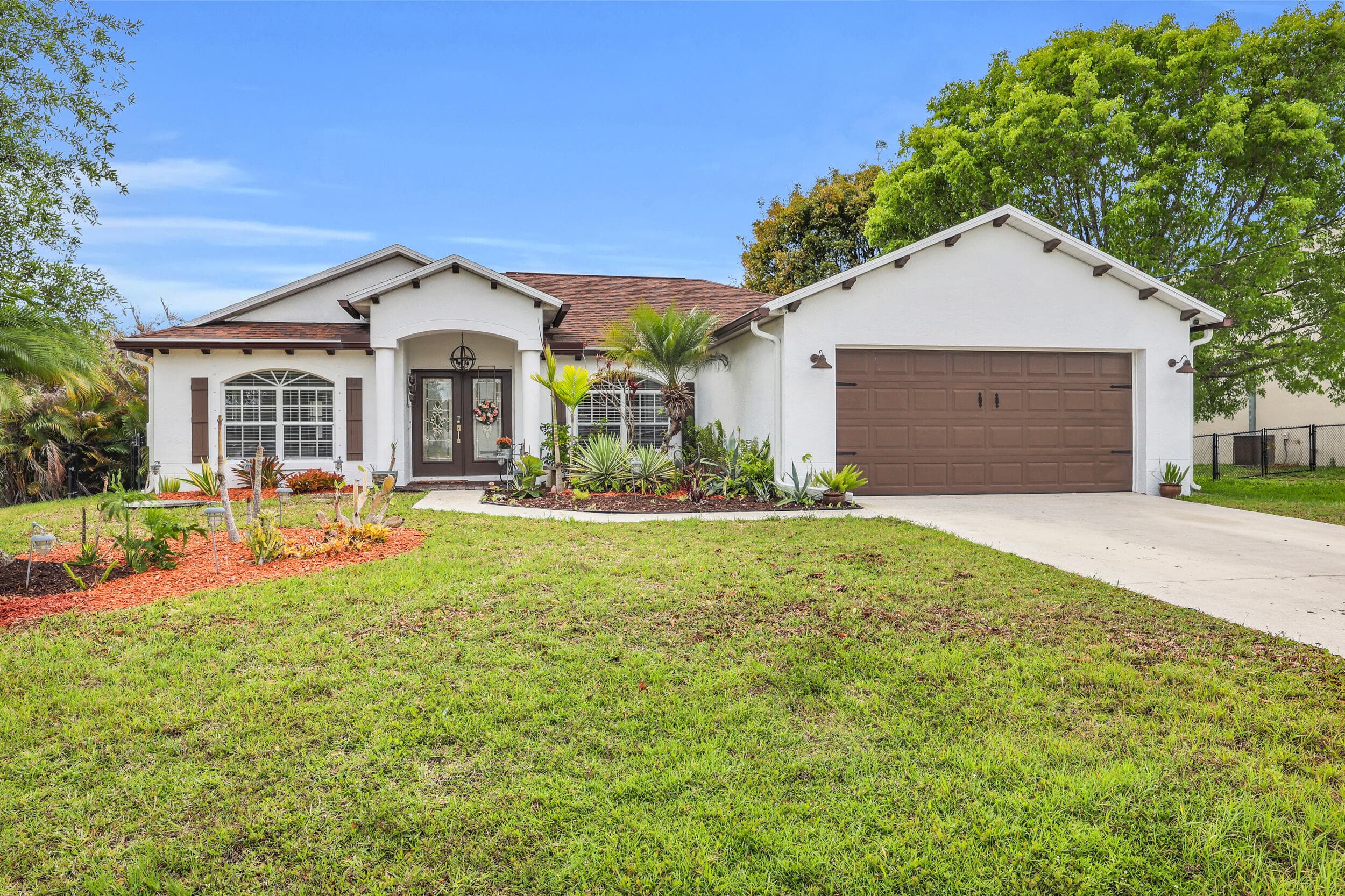 2644 SW Fairgreen Road, Port St. Lucie, FL 34987 — photo 1 of 27