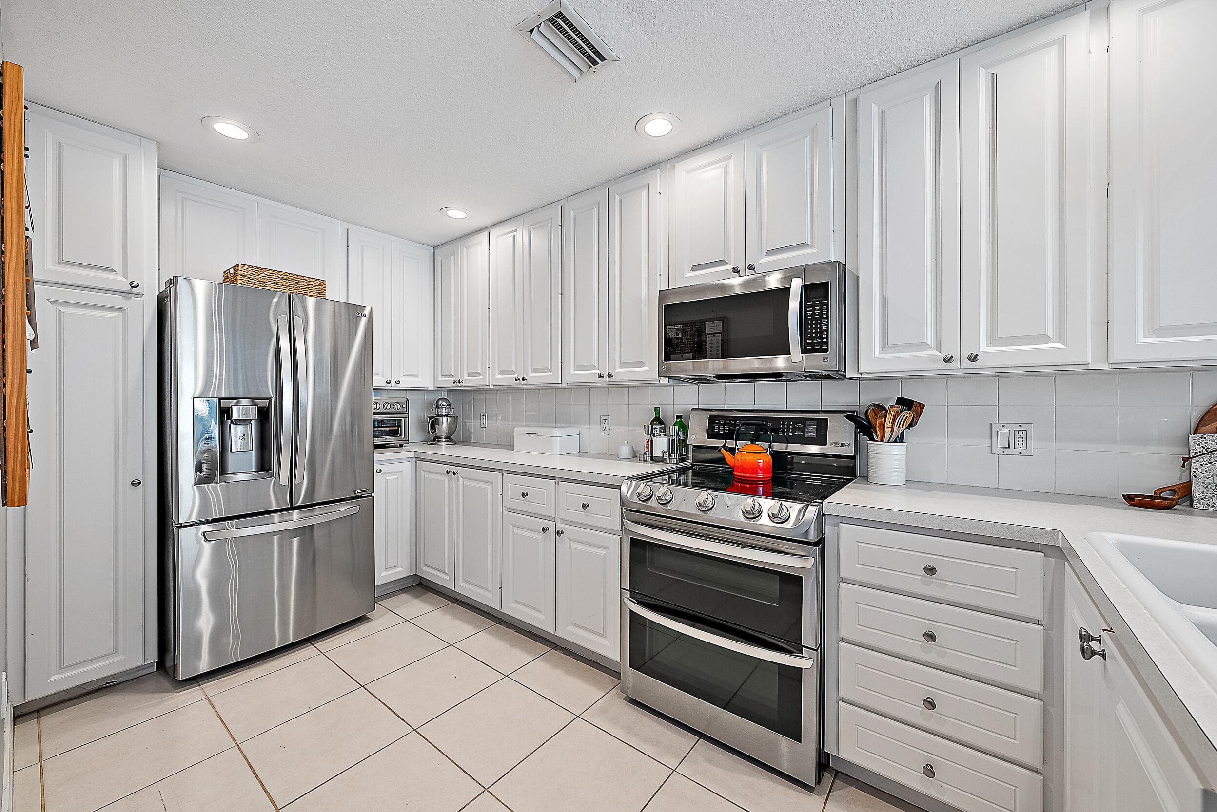 107 Rivinia Drive, Jupiter, FL 33458 — photo 4 of 28