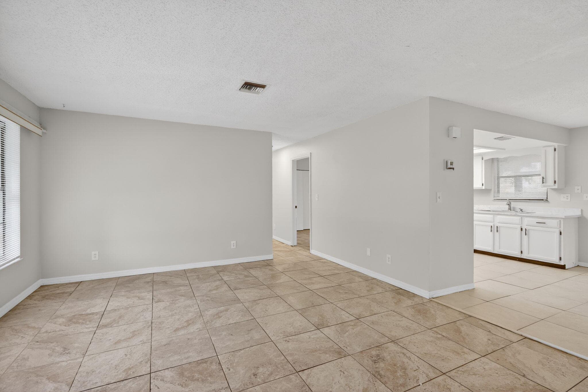 941 SE Atlantus Avenue, Port St. Lucie, FL 34983 — photo 4 of 73