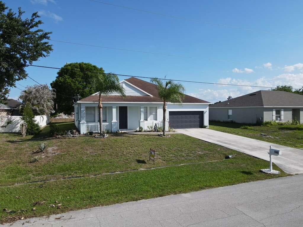948 SW Jeremko Avenue, Port St. Lucie, FL 34953 — photo 1 of 23