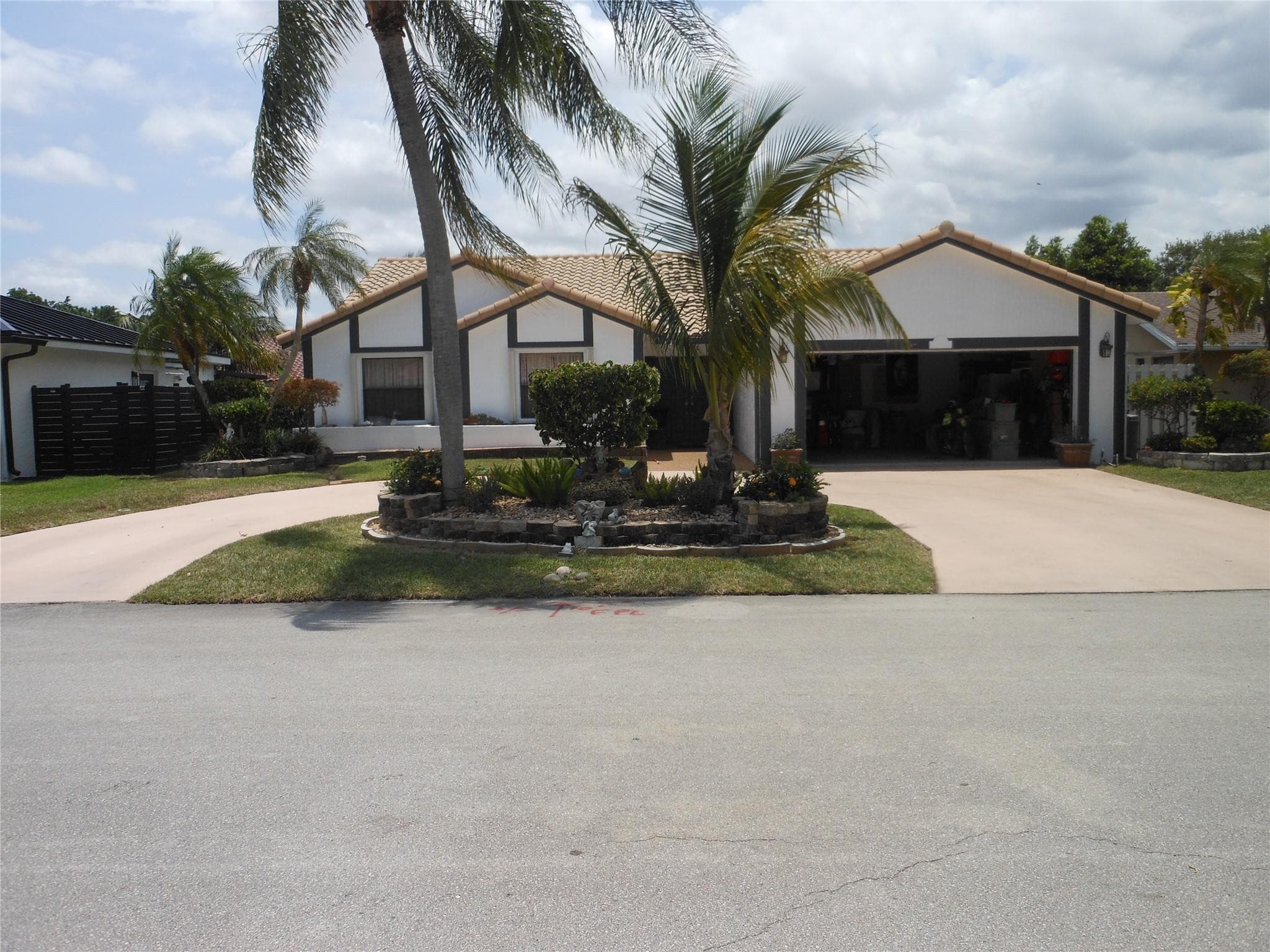 8706 NW 83rd Street, Tamarac, FL 33321 — photo 1 of 25