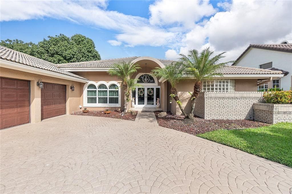 11999 Classic Drive, Coral Springs, FL 33071 — photo 1 of 40